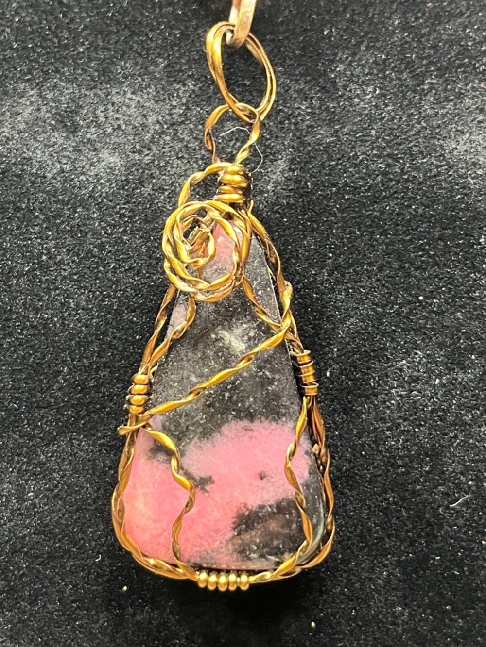 Wire wrapped pink opal pendant